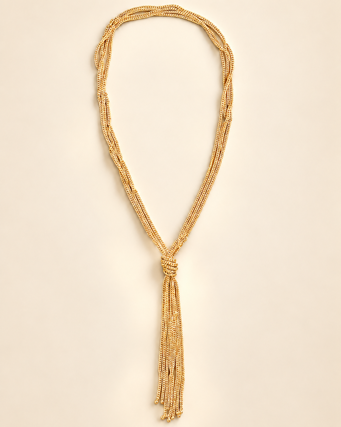 Collier Sautoir Nœud Doré — Tombé du collier